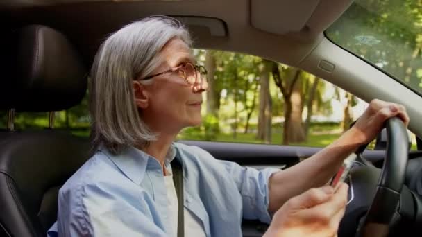 Stock Video Caucasian Elderly Mature Female Woman Senior Auto Taxi Driver Car