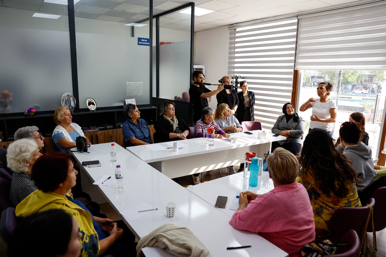 K A D I N D A N I S M A M E R K E Z I N D E I S A R E T D I L I E G 1012014 300226