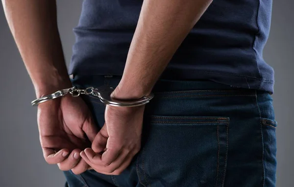 Depositphotos 446198728 Stock Photo Man With His Hands Handcuffed-3