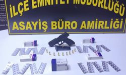 Alanya'da ruhsatsız silah ve uyuşturucu hap ele geçirildi