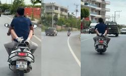 Motosiklette kucağında yolcu taşıdı