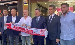 Bakan Tunç'a esnaftan Antalyaspor atkısı