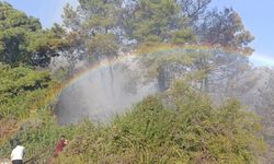 Yangını söndürürken gökkuşağı oluştu