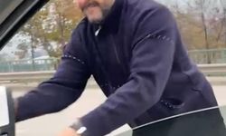 Meclis üyesini sıkıştırıp, aracı yumrukladı