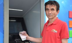 ATM'de bulduğu parayı bankaya teslim etti