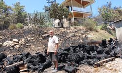 Emekli itfaiyeci evini alevlerden kurtardı