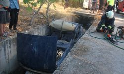 Serik'te otomobil sulama kanalına düştü