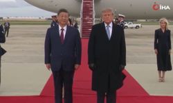 Trump, Xi'yi hava üssünde kırmızı halıyla karşıladı
